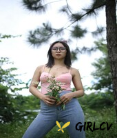 adorable asian girl posing in her sexy top and tight jeans outdoors3273
