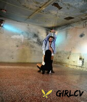 clothed female tortures her male slave while denying his hard dick an orgasm