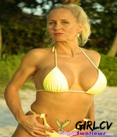 blonde milf amateur banana boat poses in a hot yellow bikini on the beach41418