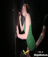 clothed redhead chick shows off a mouthful of cum after a gloryhole blowjob143354