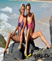 dominika c and a girlfriend model revealing swimsuits at the ocean18170
