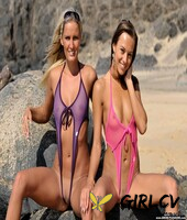 dominika c and a girlfriend model revealing swimsuits at the ocean18175