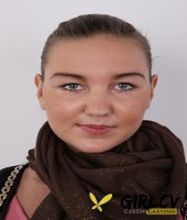 amateur model jana wears her hair put up while slowly getting stark naked