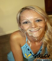 young blonde girl layla gets cum on her face during a blowbang52223