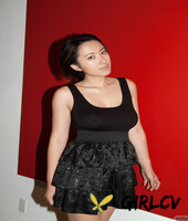 skinny chinese babe li zheng poses in the black t-shirt and skirt130367