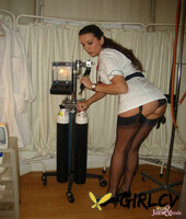 mature nurse nylon jane exposes her upskirt panties on a vintage medical chair104612