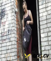 solo girl diana sweet takes a piss in the entrance to an abandoned building101914