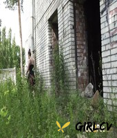 solo girl diana sweet takes a piss in the entrance to an abandoned building101916