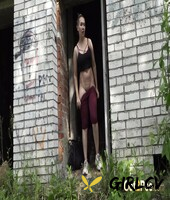 solo girl diana sweet takes a piss in the entrance to an abandoned building101905