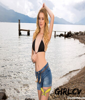 petite hottie in tight blue jeans olivia preston posing on the beach22659