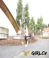 dark-haired girl maddi black squats beside a car to take a piss189673