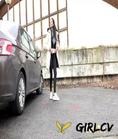 dark-haired girl maddi black squats beside a car to take a piss189674