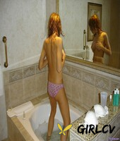beautiful skinny amateur vanessa doffs her undies and dances wet in a tub