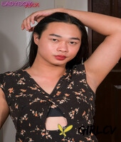 asian shemale ronace removes her dress and flaunts her hairy cock47974