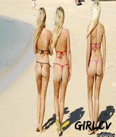 blonde girls model micro bikinis at the beach while wearing sunglasses14474