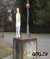 natural blonde katy sky takes a piss on a paved road during the day209972
