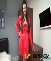 18-year-old brunette uncovers her full breasts while getting naked in hosiery