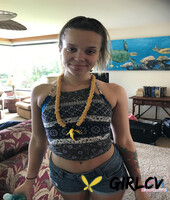 amateur girlfriend liza rowe poses in her sexy bikini on a sandy beach