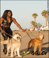 black bodybuilder jaquita person taylor flexes outside in black leather attire92884