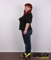 redhead plumper maja takes a seat after stripping naked afore a wall121323