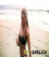 sexy blonde abby marie flaunts her incredible ass in black undies on the beach