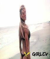 sexy blonde abby marie flaunts her incredible ass in black undies on the beach210144