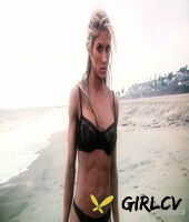 sexy blonde abby marie flaunts her incredible ass in black undies on the beach210145