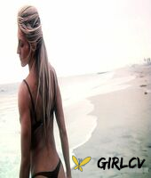 sexy blonde abby marie flaunts her incredible ass in black undies on the beach210146