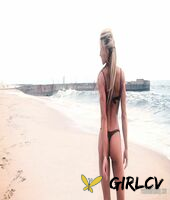 sexy blonde abby marie flaunts her incredible ass in black undies on the beach210151