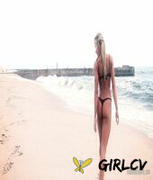sexy blonde abby marie flaunts her incredible ass in black undies on the beach210152