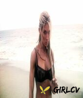 sexy blonde abby marie flaunts her incredible ass in black undies on the beach210135