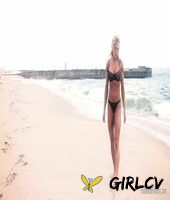 sexy blonde abby marie flaunts her incredible ass in black undies on the beach210153