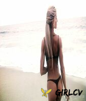sexy blonde abby marie flaunts her incredible ass in black undies on the beach210136