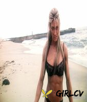 sexy blonde abby marie flaunts her incredible ass in black undies on the beach210137