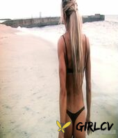 sexy blonde abby marie flaunts her incredible ass in black undies on the beach210138