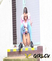 young girl adele unicorn pulls down blue jeans to pee on a set of public steps140227