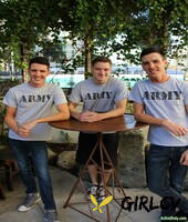 three army brats pose outdoors before a gay threesome gets underway