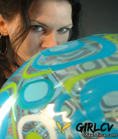 brunette amateur mina gorey plays with balls while wearing a see-through top42318