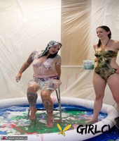 amateur lesbians douse each other in gunk while in a wading pool35181