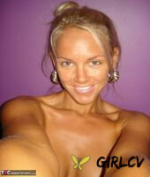 hot blonde aussie jewel displays her big boobs while taking nude selfies