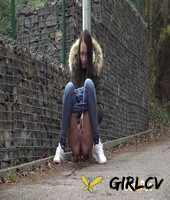 brunette girl mistika gets caught with her pants down while peeing on a road