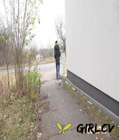 brunette girl mistika gets caught with her pants down while peeing on a road