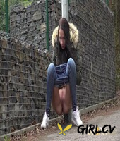 brunette girl mistika gets caught with her pants down while peeing on a road