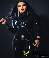 latex-clad pornstars with big tits fucking in an interracial orgy